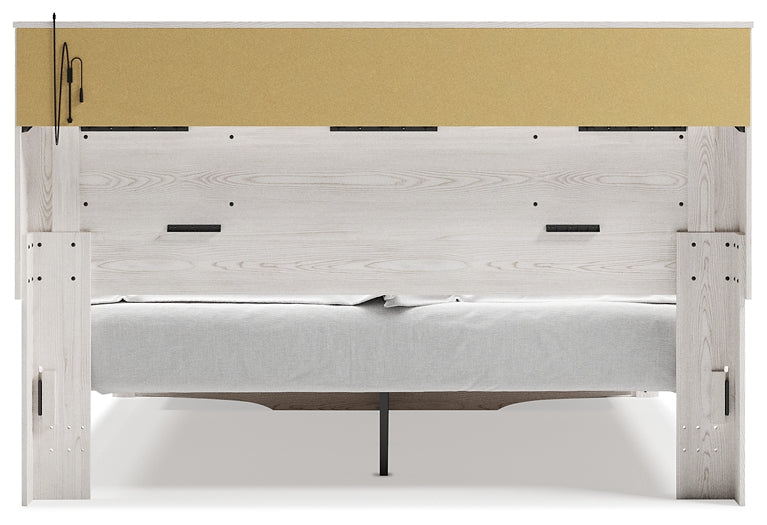 Altyra Queen Upholstered Bookcase Bed with Storage