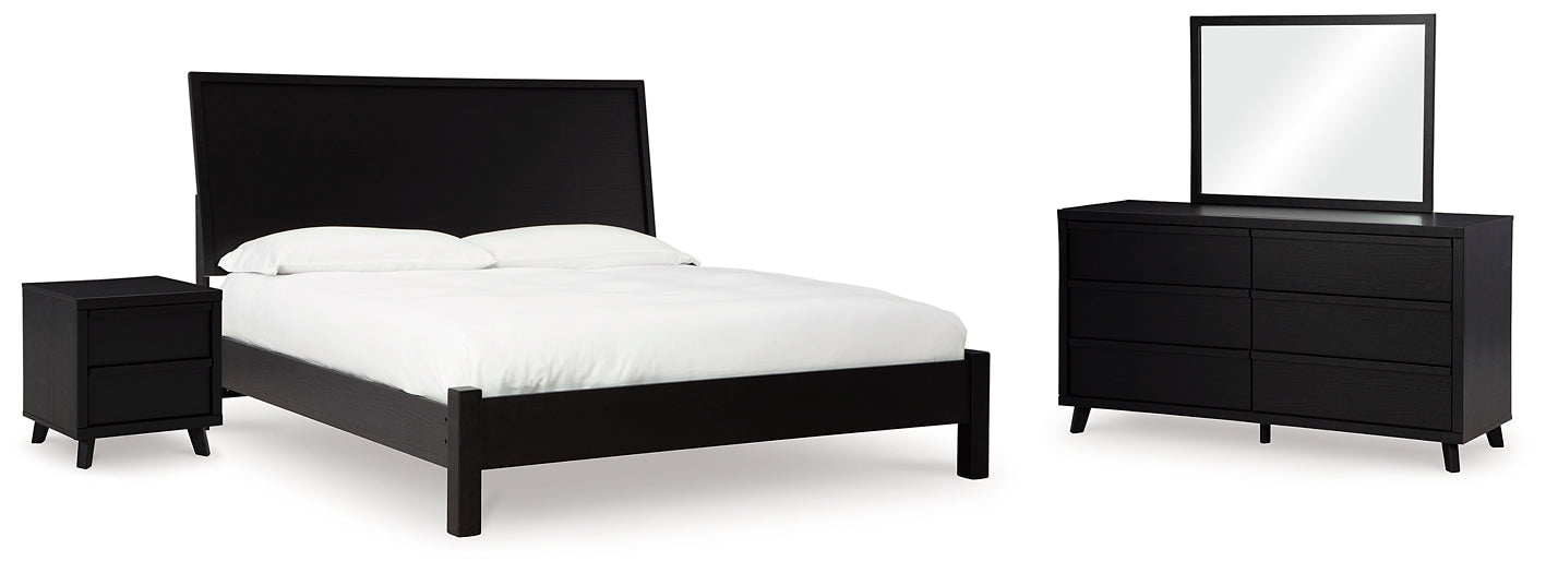 Danziar Queen Panel Bed with Mirrored Dresser and Nightstand