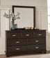 Covetown Queen Panel Bed with Mirrored Dresser and Nightstand