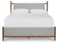 Lyncott Queen Upholstered Bed with Mirrored Dresser
