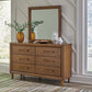 Lyncott California King Upholstered Bed with Mirrored Dresser