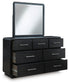 Rowanbeck California King Upholstered Panel Bed, Dresser, Mirror, Chest and Nightstand