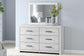Cayboni King Panel Bed with Mirrored Dresser and Nightstand