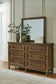 Sturlayne California King Upholstered Panel Bed, Dresser, Mirror, Chest and Nightstand