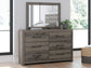 Urbanoore King Panel Bed, Dresser, Mirror, Chest and Nightstand