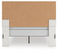 Zuraleus Queen Upholstered Panel Bed, Dresser, Mirror, Chest and Nightstand
